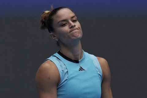 Maria Sakkari of Greece reacts after losing a point to Coco Gauff of the United States during the women's singles quarterfinal match in the China Open tennis tournament at the Diamond Court in Beijing, Friday, Oct. 6, 2023. (AP Photo/Andy Wong)
