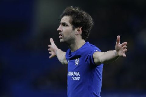 Chelsea's Cesc Fabregas reacts to a decision by the referee during the English Premier League soccer match between Chelsea and West Bromwich Albion at Stamford Bridge stadium in London, Monday, Feb. 12, 2018. (AP Photo/Alastair Grant)