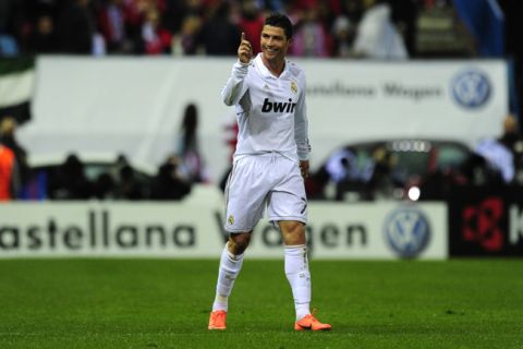 Real Madrid's Portuguese forward Cristiano Ronaldo celebrates after scoring during the Spanish league football match Atletico Madrid against Real Madrid at the Vicente Calderon stadium in Madrid on April 11, 2012.    AFP PHOTO/JAVIER SORIANO (Photo credit should read JAVIER SORIANO/AFP/Getty Images)