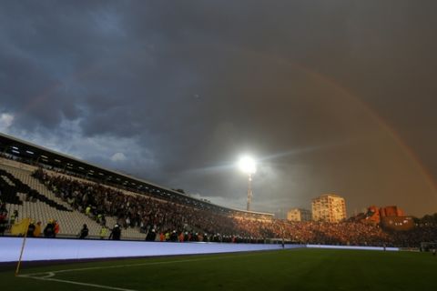 A rainbow rises over stadium during a Serbian National Cup final soccer match between Partizan and Red Star, in Belgrade, Serbia, Saturday, May 27, 2017. (AP Photo/Darko Vojinovic)