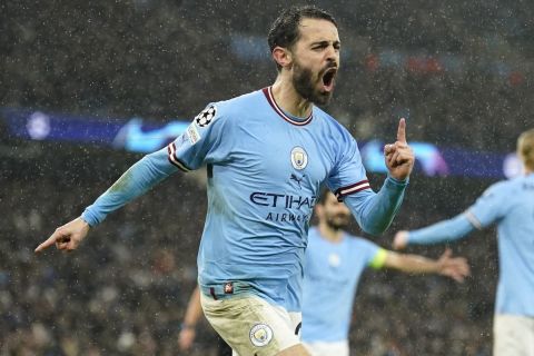 Manchester City's Bernardo Silva celebrates after scoring his side's second goal during the Champions League quarterfinal, first leg, soccer match between Manchester City and Bayern Munich at the Etihad stadium in Manchester, England, Tuesday, April 11, 2023. (AP Photo/Dave Thompson)