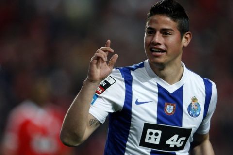 Porto's James celebrates his goal against Benfica during their Portuguese Premier League soccer match at Luz stadium in Lisbon March 2, 2012. REUTERS/Marcos Borga (PORTUGAL - Tags: SPORT SOCCER)