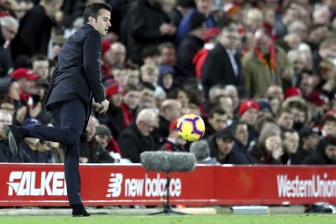 Everton manager Marco Sliva controls the ball during the English Premier League soccer match between Liverpool and Everton at Anfield Stadium in Liverpool, England, Sunday, Dec. 2, 2018. (AP Photo/Jon Super)