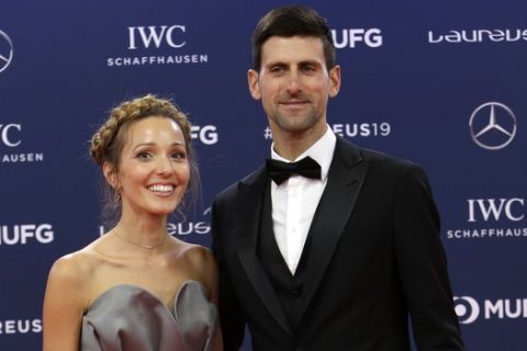 Serbian tennis player Novak Djokovic and his wife Jelena arrive for the 2019 Laureus World Sports Awards, Monday, Feb. 18, 2019. (AP Photo/Claude Paris)