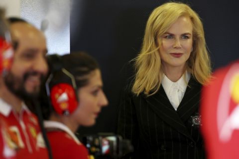 Australian actress Nicole Kidman stands in the Ferrari team garage at the conclusion of the final practice session for the Australian Formula One Grand Prix in Melbourne, Australia, Saturday, March 25, 2017. (AP Photo/Rick Rycroft)