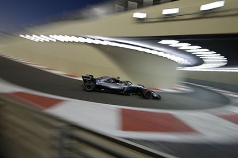 Mercedes driver Valtteri Bottas of Finland steers his car during the second free practice at the Yas Marina racetrack in Abu Dhabi, United Arab Emirates, Friday Nov. 23, 2018. The Emirates Formula One Grand Prix will take place on Sunday. (AP Photo/Luca Bruno)