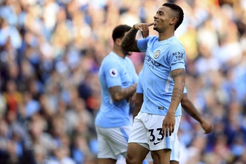 Manchester City's Gabriel Jesus celebrates scoring his side's fourth goal of the game during the English Premier League soccer match between Manchester City and Stoke City at Etihad Stadium, Manchester, England, Saturday, Oct. 14, 2017. (Mike Egerton/PA via AP)