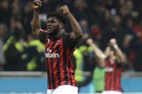 AC Milan's Franck Kessie, left, reacts at the end of the Serie A soccer match between AC Milan and Lazio, at the San Siro stadium in Milan, Italy, Saturday, April 13, 2019. (AP Photo/Luca Bruno)