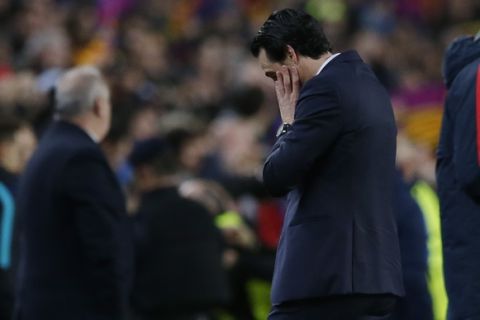 PSG head coach Unai Emery reacts at the end of the Champions League round of 16, second leg soccer match between FC Barcelona and Paris Saint Germain at the Camp Nou stadium in Barcelona, Spain, Wednesday March 8, 2017. Barcelona won the match 6-1 (6-5 on aggregate). (AP Photo/Manu Fernandez)