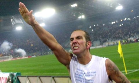 ** FILE **  Lazio's Paolo Di Canio gives a straight-arm salute to supporters, at the end of the Serie A top league soccer match between Lazio and AS Roma at Rome's Olympic stadium, in this Thursday, Jan. 6, 2005 file photo. Italy's soccer federation said it would investigate Di Canio for making what appeared to be a neo-fascist salute. 