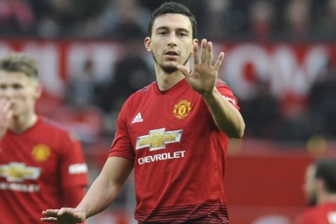 Manchester United's Matteo Darmian reacts during the English FA Cup third round soccer match between Manchester United and Reading at Old Trafford in Manchester, England, Saturday, Jan. 5, 2019. (AP Photo/Rui Vieira)