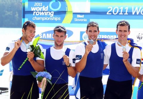BLED, SLOVENIA - SEPTEMBER 04:  Stergios Papachristos, Ioannis Tsilis, Georgios Tziallas, Ioannis Christou of Greece pose with their silver medals after the Men's Four final during day eight of the FISA Rowing World Championships at Lake Bled on September 4, 2011 in Bled, Slovenia.  (Photo by Richard Heathcote/Getty Images)