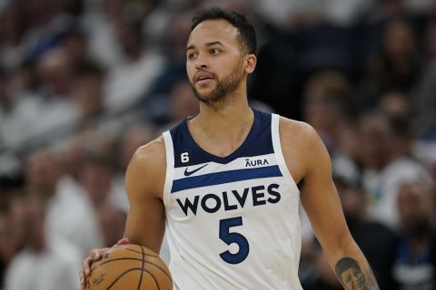 Minnesota Timberwolves forward Kyle Anderson (5) dribbles down the court during the second half of Game 3 of an NBA basketball first-round playoff series against the Denver Nuggets, Friday, April 21, 2023, in Minneapolis. (AP Photo/Abbie Parr)