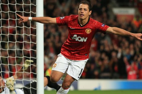 MANCHESTER, ENGLAND - OCTOBER 23:  Javier Hernandez of Manchester United celebrates scoring his team's third goal to make the score 3-2 during the UEFA Champions League Group H match between Manchester United and SC Braga at Old Trafford on October 23, 2012 in Manchester, England.  (Photo by Richard Heathcote/Getty Images)