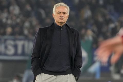 FILE - Roma's head coach Jose Mourinho stands on the pitch during his team's warm up ahead of the quarterfinal Italian Cup soccer match between Lazio and Roma at Rome's Olympic Stadium, Wednesday, Jan. 10, 2024. Roma has announced on Tuesday, Jan. 16, 2024 that José Mourinho is leaving the club with immediate effect. (AP Photo/Gregorio Borgia, File)