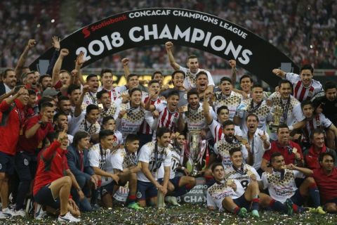 Chivas players celebrate winning the CONCACAF Champions League final soccer match in Guadalajara, Mexico, Wednesday, April, 25, 2018. Chivas defeated Toronto FC in a penalty shoot out. (AP Photo/Eduardo Verdugo)