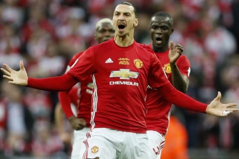 United's Zlatan Ibrahimovic celebrates after scoring the opening goal during the English League Cup final soccer match between Manchester United and Southampton FC at Wembley stadium in London, Sunday, Feb. 26, 2017. (AP Photo/Kirsty Wigglesworth)