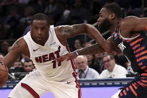 Miami Heat guard Dion Waiters (11) moves the ball against New York Knicks guard Kadeem Allen (0) during the first half of an NBA basketball game on Saturday, March 30, 2019, in New York. The Heat won 100-92. (AP Photo/Nicole Sweet)