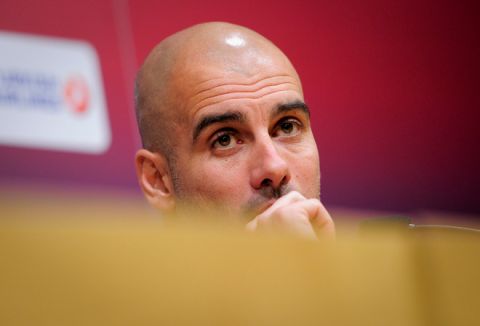 FC Barcelona's coach Pep Guardiola gives a press conference at the camp nou stadium in Barcelona on January 24, 2012 on the eve of the Spanish Cup "El clasico" football match Barcelona vs Real Madrid.  AFP PHOTO / JOSEP LAGO (Photo credit should read JOSEP LAGO/AFP/Getty Images)