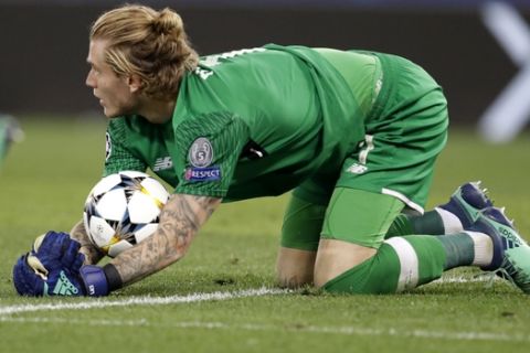 Liverpool goalkeeper Loris Karius makes a save during the Champions League semifinal second leg soccer match between Roma and Liverpool at the Olympic Stadium in Rome, Wednesday, May 2, 2018. (AP Photo/Andrew Medichini)