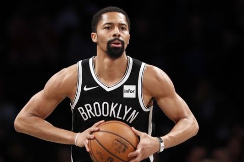 Brooklyn Nets guard Spencer Dinwiddie looks to pass during the first quarter of an NBA basketball game against the Memphis Grizzlies, Wednesday, March 4, 2020, in New York. (AP Photo/Kathy Willens)