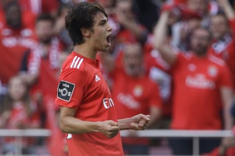 Benfica's Joao Felix celebrates after scoring his side's second goal during a Portuguese league last round soccer match between Benfica and Santa Clara at the Luz stadium in Lisbon, Saturday, May 18, 2019. (AP Photo/Armando Franca)
