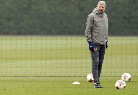 Arsenal manager Arsene Wenger attends a training session with his team at London Colney, Wednesday Feb. 21, 2018. (Adam Davy/PA via AP)