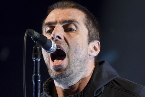 In this Sept. 22, 2017 photo British musician Liam Gallagher performs at the "Docks" during the "Warner Music Night" at the Reeperbahn Festival in Hamburg, Germany (Axel Heimken/dpa via AP)