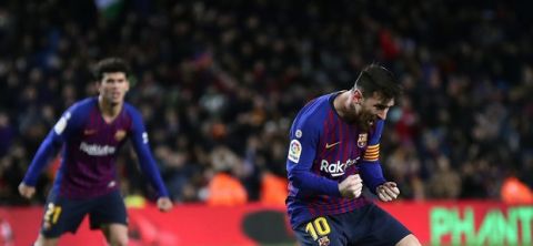 FC Barcelona's Lionel Messi celebrates after scoring during the Spanish La Liga soccer match between FC Barcelona and Valencia at the Camp Nou stadium in Barcelona, Spain, Saturday, Feb. 2, 2019. (AP Photo/Manu Fernandez)