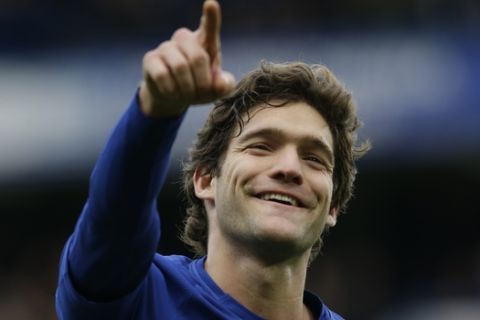 Chelsea's Marcos Alonso celebrates after scoring his side's third goal during the English FA Cup fourth round soccer match between Chelsea and Newcastle United at Stamford Bridge stadium in London, Sunday, Jan. 28, 2018 . (AP Photo/Alastair Grant)