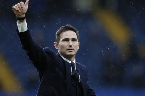 FILE - In this Saturday, Feb. 25, 2017 file photo, former Chelsea player Frank Lampard does a lap of honour at half time during the English Premier League soccer match between Chelsea and Swansea City at Stamford Bridge stadium in London. Chelsea has mastered the art of thriving amid adversity more than any other English club. This offseason looks to be particularly challenging for Chelsea because of a transfer ban, the departure of its best player and the need for another new coach following the departure of Maurizio Sarri. The favorite to be Chelseas next manager is Frank Lampard, a club great who is its all-time top scorer with 211 goals. (AP Photo/Kirsty Wigglesworth, file)