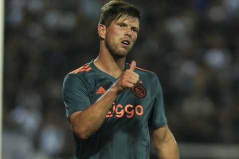 Ajax's Klaas-Jan Huntelaar reacts after a missing attack against PAOK during their Champions League third qualifying round, first leg soccer match between PAOK FC and AFC Ajax, at Toumba Stadium in the northern Greek port city of Thessaloniki, Tuesday, Aug. 6, 2019. (AP Photo/Giannis Papanikos)