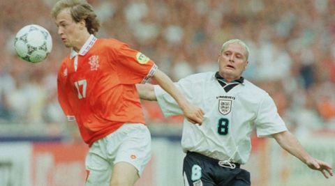  The Netherland's Jordi Cruyff beats England's Paul Gascoigne, right, to the ball during their European Soccer Championship group A match at Wembley Stadium, Tuesday June 18 1996.(AP Photo/ Diether Endlicher)