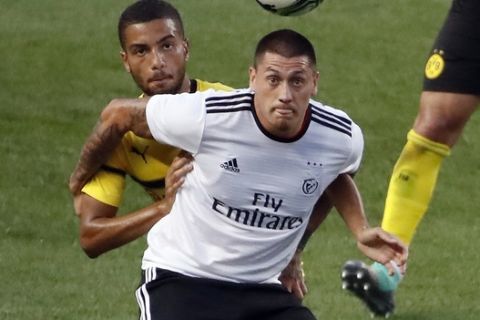 Benfica forward Nicolas Castillo, front, and Borussia Dortmund defender Jeremy Toljan vie for the ball during an International Champions Cup tournament soccer match in Pittsburgh, Wednesday, July 25, 2018. (AP Photo/Gene J. Puskar)