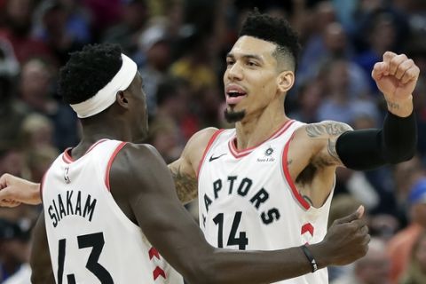 Toronto Raptors' Danny Green (14) celebrates his game winning shot against the Orlando Magic with teammate Pascal Siakam (43) in the final seconds of an NBA basketball game, Tuesday, Nov. 20, 2018, in Orlando, Fla. (AP Photo/John Raoux)
