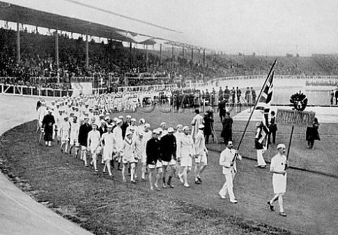 The Great Britain team parades around the stadium