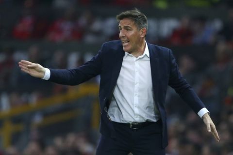 Celta's head coach Eduardo Berizzo reacts towards his players from the technical area during the Europa League semifinal second leg soccer match between Manchester United and Celta Vigo at Old Trafford in Manchester, England, Thursday, May 11, 2017. (AP Photo/Dave Thompson)