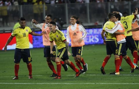 Colombia's James Rodriguez , third left, celebrates with teammates after playing Peru to a 1-1 draw during a World Cup qualifying soccer match against Colombia in Lima, Peru, Tuesday, Oct. 10, 2017. (AP Photo/Rodrigo Abd)