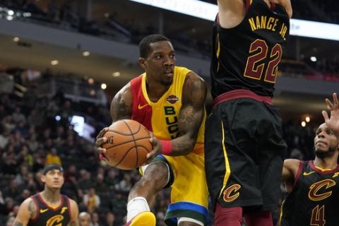 Milwaukee Bucks' Eric Bledsoe looks to pass during the second half of an NBA basketball game against the Cleveland Cavaliers Monday, Dec. 10, 2018, in Milwaukee. (AP Photo/Morry Gash)