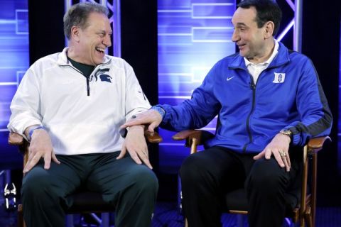 Michigan State head coach Tom Izzo and Duke head coach Mike Krzyzewski talk during a CBS Sports interview for their NCAA Final Four tournament college basketball semifinal game Thursday, April 2, 2015, in Indianapolis. (AP Photo/David J. Phillip)