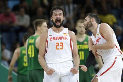 Spains Sergio Llull (23) celebrates a score against Lithuania during a men's basketball game at the 2016 Summer Olympics in Rio de Janeiro, Brazil, Saturday, Aug. 13, 2016. (AP Photo/Eric Gay)

