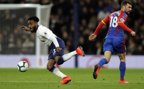 Tottenham's Danny Rose vies for the ball with Crystal Palace's James McArthur, right, during the English Premier League soccer match betweenTottenham Hotspur and Crystal Palace, the first Premiership match at the new Tottenham Hotspur stadium in London, Wednesday, April 3, 2019. (AP Photo/Kirsty Wigglesworth)