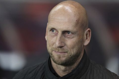 Feyenoord's manager Jaap Stam looks on ahead of the Europa League group G soccer match between Rangers and Feyenoord at Ibrox, Glasgow, Scotland, Thursday, Sept. 19, 2019. (AP Photo/Scott Heppell)