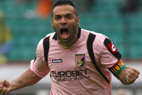 Palermo's Fabrizio Miccoli reacts after scoring during the Serie A soccer match between Siena and Palermo at Artemio Franchi stadium in Siena, Italy, Sunday, May 2, 2010. Palermo won 2-1. (AP Photo/Paolo Lazzeroni)