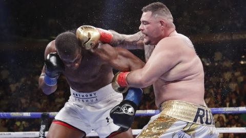 Andy Ruiz, right, punches Anthony Joshua during the seventh round of a heavyweight championship boxing match Saturday, June 1, 2019, in New York. Ruiz won the bout. (AP Photo/Frank Franklin II)