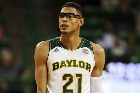 Nov 20, 2013; Waco, TX, USA; Baylor Bears center Isaiah Austin (21) reacts during the game against the Charleston Southern Buccaneers at The Ferrell Center. Baylor won 69-64. Mandatory Credit: Kevin Jairaj-USA TODAY Sports