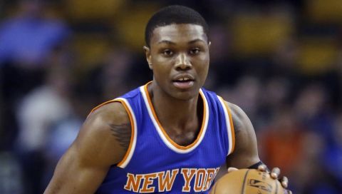 New York Knicks forward Cleanthony Early (17) dribbles up court during the first half of an NBA basketball game against the Boston Celtics in Boston, Wednesday, Feb. 25, 2015. (AP Photo/Elise Amendola)