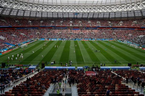 Russia, left, and Saudi Arabia warm up before their group A match which opens the 2018 soccer World Cup at the Luzhniki stadium in Moscow, Russia, Thursday, June 14, 2018. (AP Photo/Darko Bandic)