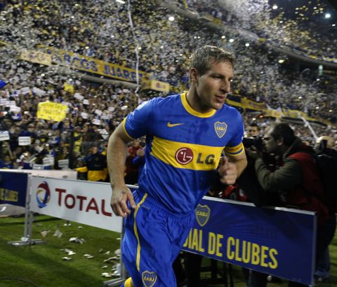 Argentina's forward Martin Palermo of Boca Juniors enters to the field to play his last professional match, against banfield, before his farewell at La Bombonera stadium in Buenos Aires, on June 12, 2011.   AFP PHOTO/Alejandro PAGNI (Photo credit should read ALEJANDRO PAGNI/AFP/Getty Images)