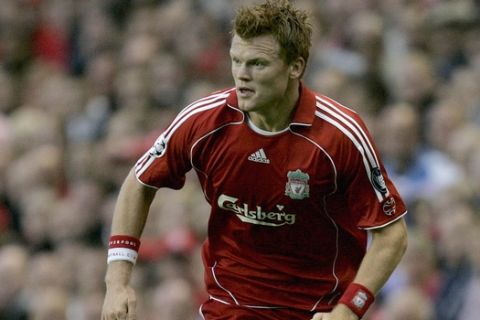 Liverpool's John Arne Riise in action against Maccabi Haifa during the Champions League third-round qualifier first leg soccer match at Anfield Stadium, Liverpool, England, Wednesday Aug. 9, 2006. (AP Photo/Dave Thompson)